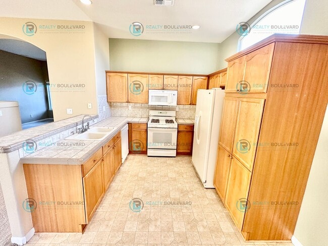 Building Photo - Open Layout, Big Yard, Great Location—This One Has It All!