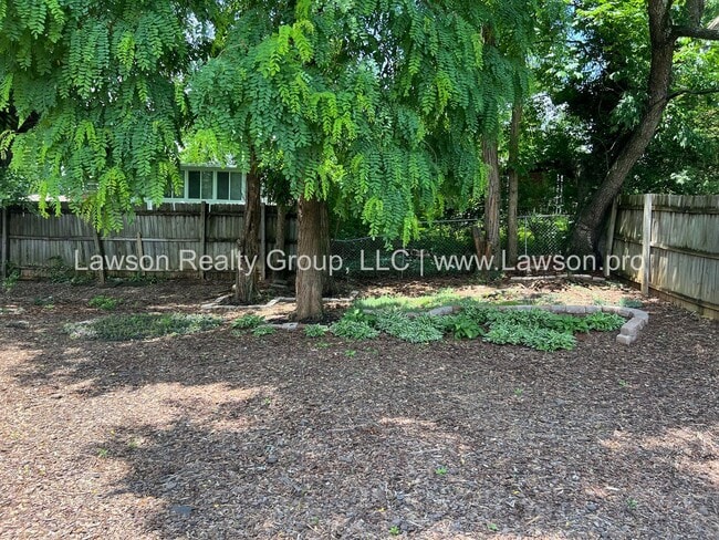 Building Photo - Charming Brick Ranch with Beautifully Land...