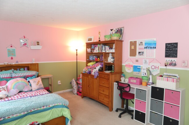 Building Photo - Available -Spacious 2 Car Garaged Townhome...