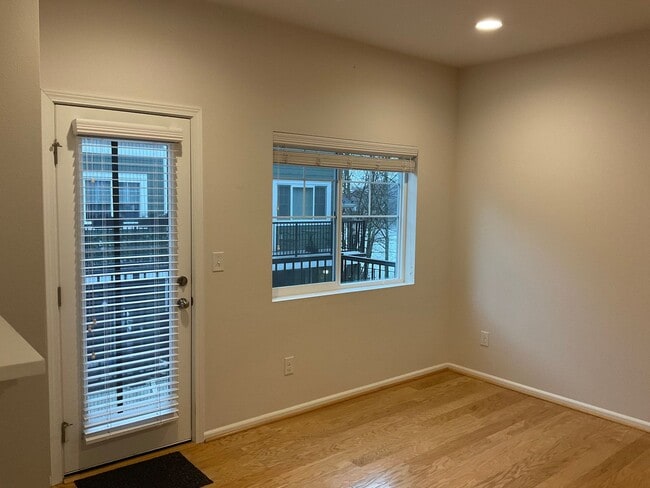 Building Photo - Riverfront Townhome with Tandem Garage & Fenced Yard