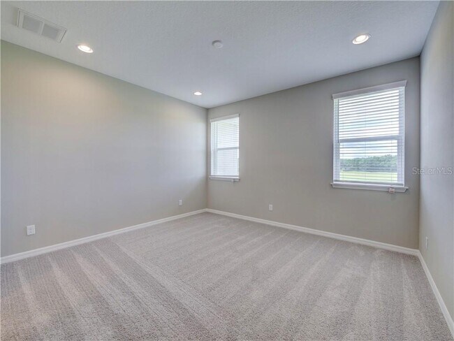 Spacious, high-quality master bedroom it has two windows and Blinds, attached large walking closet, - 1074 Amber Leaf Trail