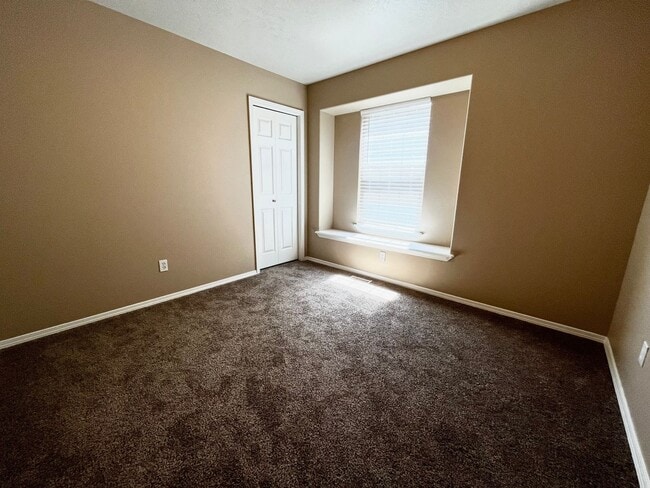 Building Photo - 4 Bedroom Home with Bonus Room Potential & RV Parking!