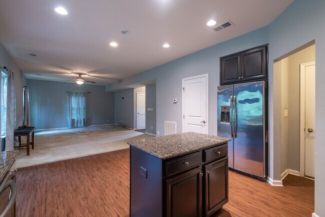 Building Photo - Spacious 4-Bedroom Home with Sunroom, Deck...