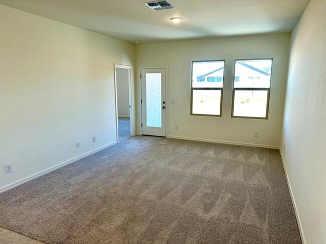 Building Photo - Beautiful new home in Bella Vista Farms, San Tan Valley! 9' ceilings, tile floors, granite counte...