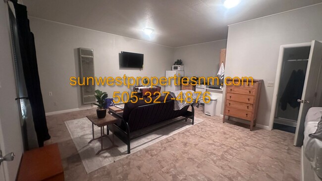 Building Photo - Fully Furnished Studio Apartment