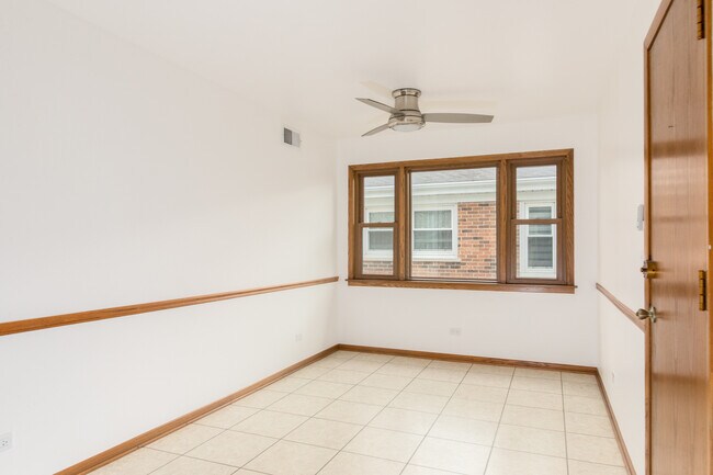 Building Photo - 8440 W Windsor Ave
