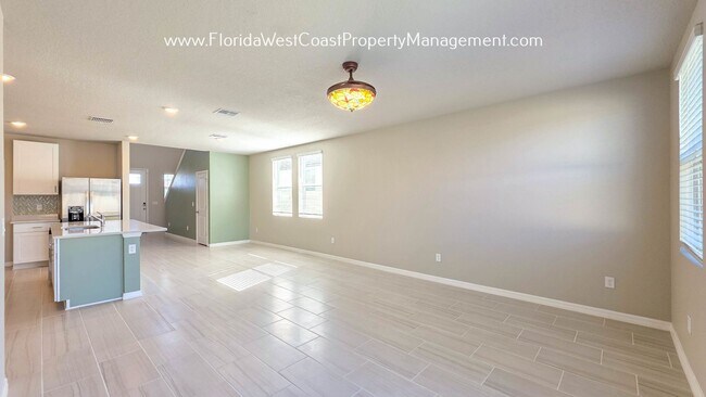 Building Photo - BRILLIANT and SPACIOUS! 4 BEDROOM/2.5 BATH PLUS LARGE BONUS-FLEX SPACE and FENCED YARD!