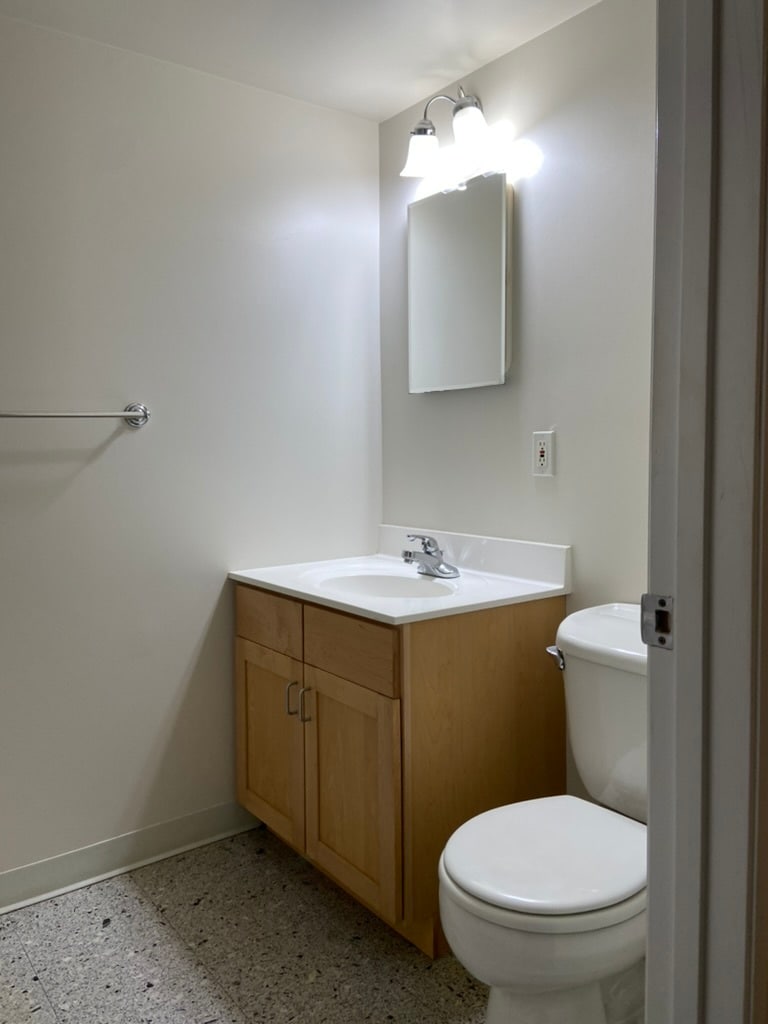 Three piece bathroom with tub - 2935 N Charles St