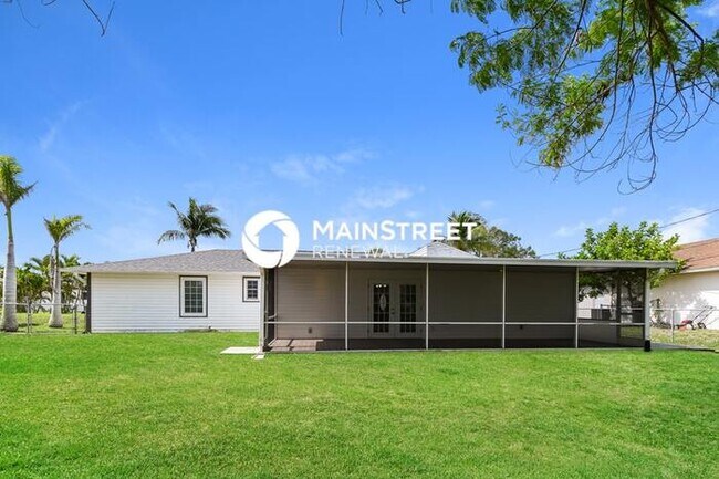 Building Photo - 3 Bedroom Pet-Friendly Home in Cape Coral, FL with Main Street Renewal