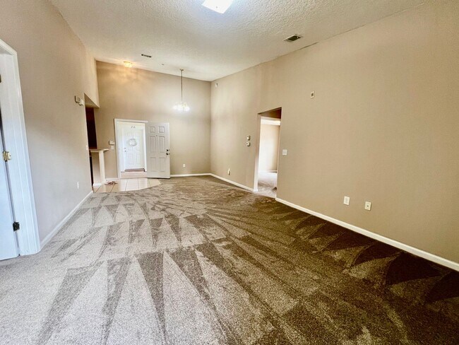 Building Photo - Gated Comfort Condo, Poolside Vibes: Your Next Home Awaits at Merrill Pines