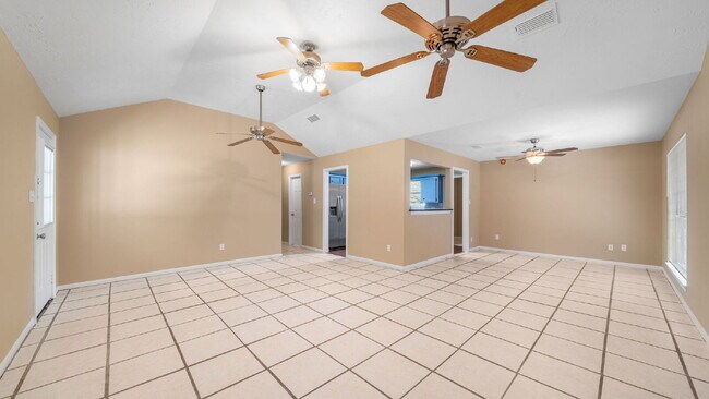 Building Photo - Enjoy comfortable, low-maintenance living in this updated, pet-friendly, carpet-free 3-bedroom ho...
