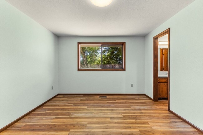 Building Photo - Ideally Located Close to It All — A Cozy Cul-de-Sac Home with Fireplace, Modern Updates & a Fence...