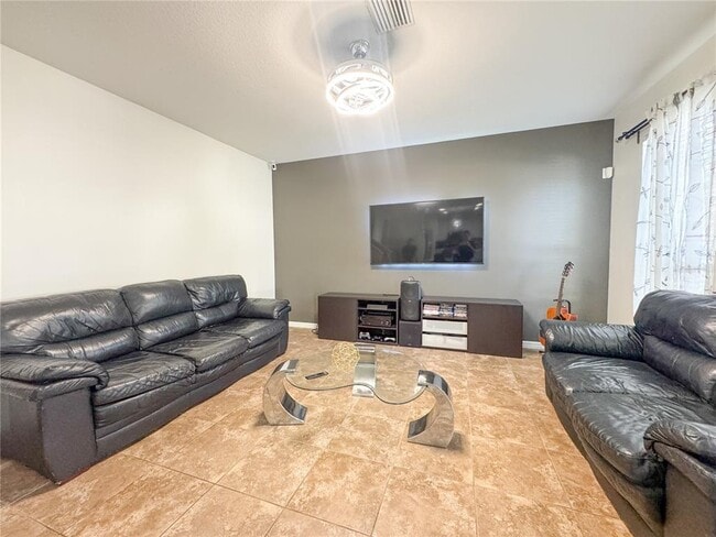 Building Photo - 5594 Angelonia Terrace