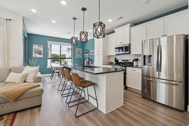 Building Photo - Modern 3BD, 2.5BA Virginia Village Townhome with 2-Car Garage