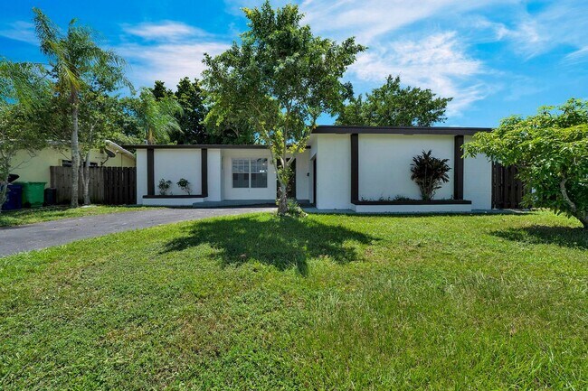 Primary Photo - Sunrise Gem: Updated 2-Bed, 2-Bath with Ga...