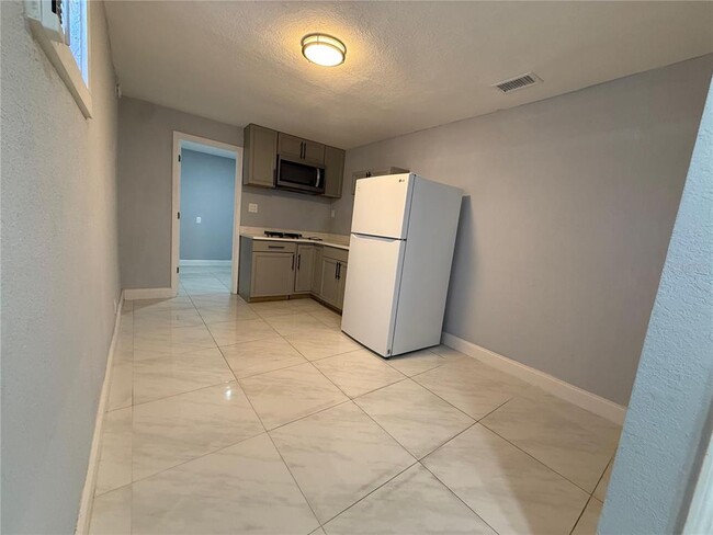 Building Photo - 8204 Dahlia Ave