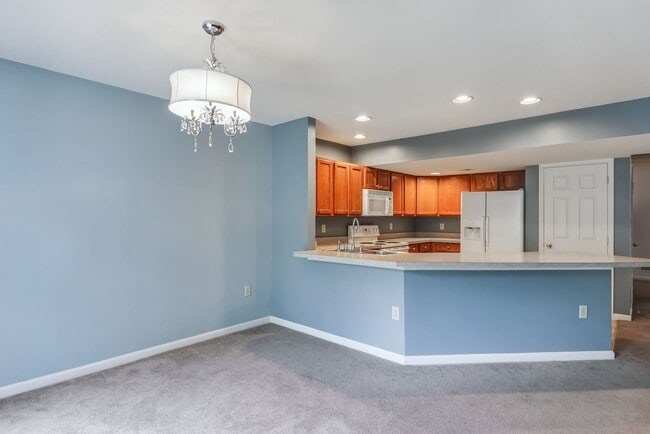 Building Photo - Three bedroom two and a half bathroom town...