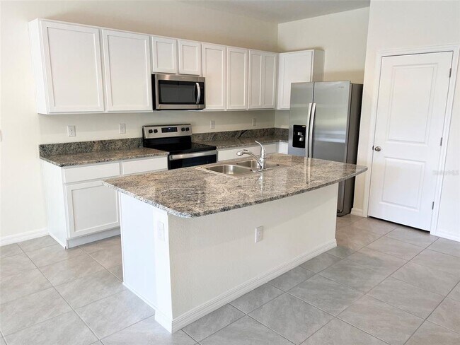 Building Photo - 8756 Milestone Dr