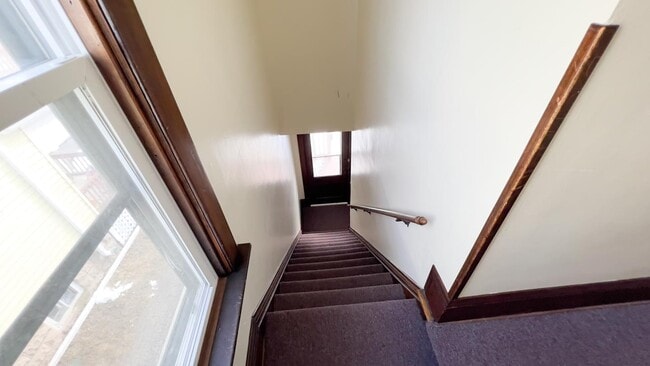Staircase to front door entrance - 1559 S 75th St