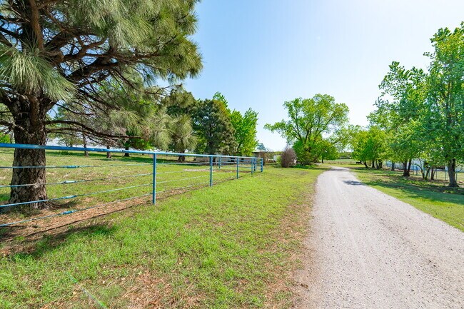 Building Photo - Beautiful country setting, but close to city limits.