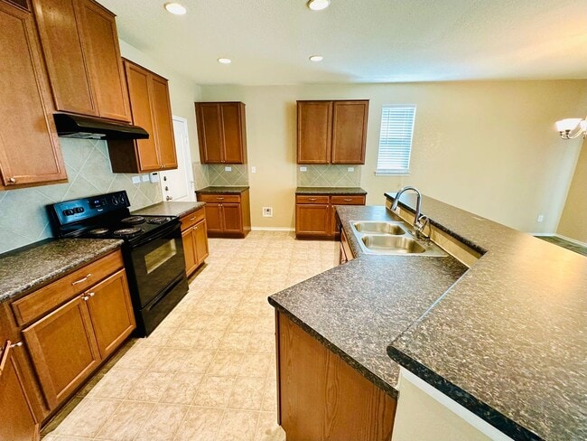 Building Photo - Your Dream Awaits! A Charming 4 bedroom 2....