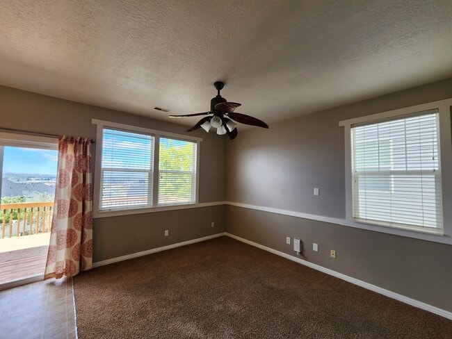 Building Photo - PRICE DROP! 3 bdrm 1.5 bath townhome! You'll love our giant DECK!