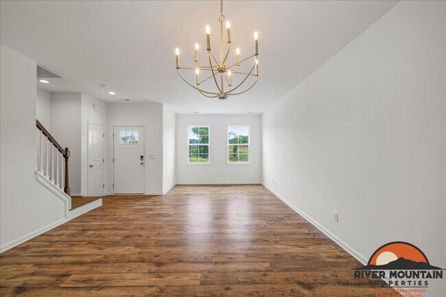 Building Photo - Well-Located Townhome with Private Off-Street Parking