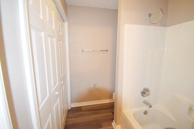 Building Photo - 2BR Patio Home with Open Layout, LVP Flooring, Private Fenced Yard, HOA Lawn Care & Convenient Bl...