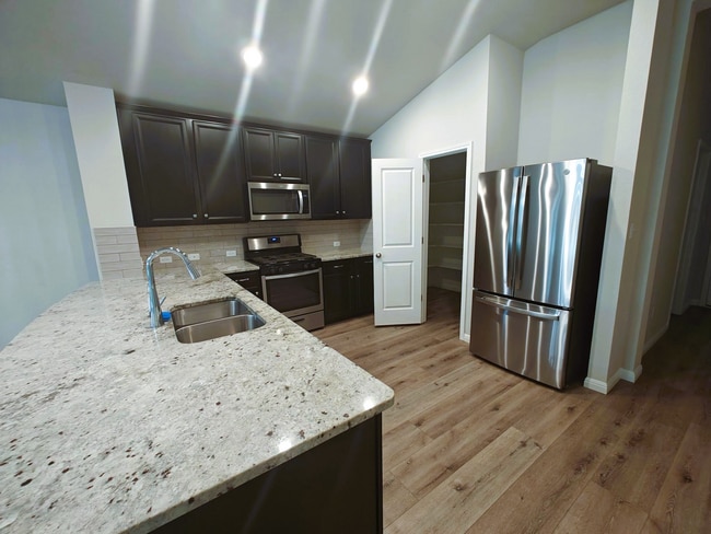 Building Photo - 6032 Genova Pl