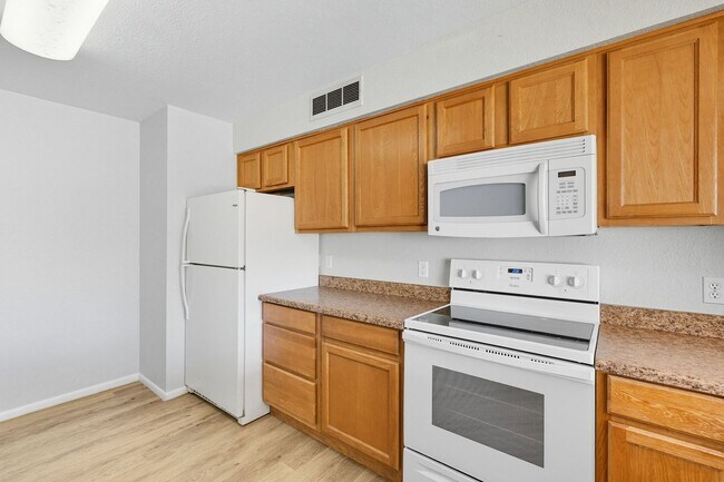 Building Photo - Three bedrooms plus big garage!