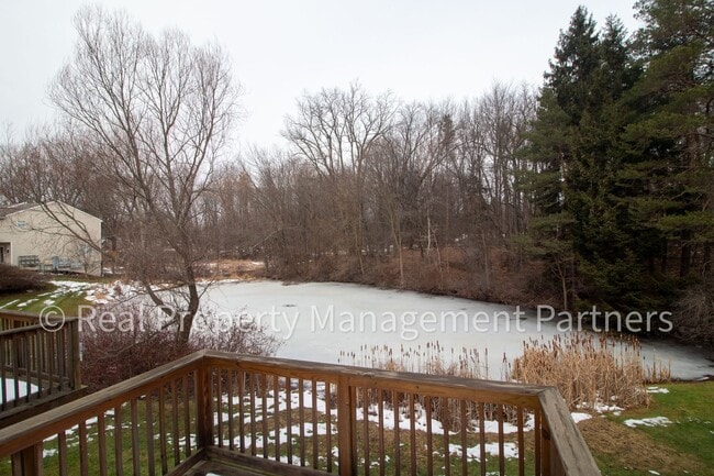 Building Photo - Forest Hills 3 Bed Townhome with Garage, Pond View and Some Utilities Included