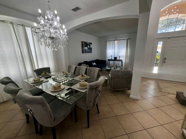 Building Photo - STUNNING Emerald Island Resort 5 bedroom 4...