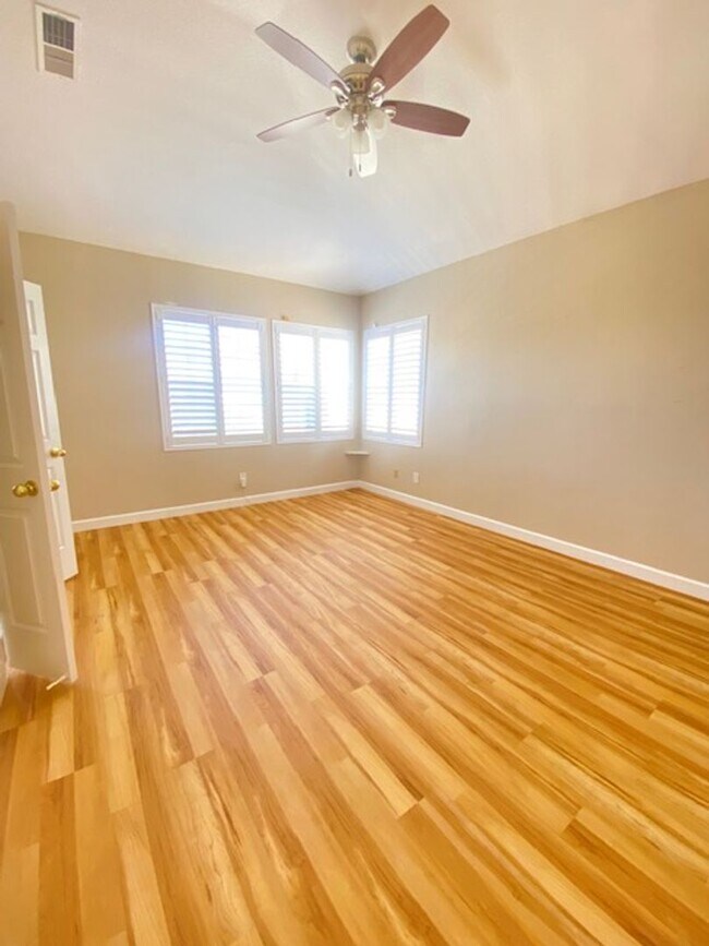 Building Photo - Spacious 5-Bedroom Home with Solar, Stunning Sunroom & Upgraded Bathrooms!