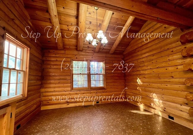 Building Photo - Rustic Retreat: Charming 1-Bedroom Log Cab...
