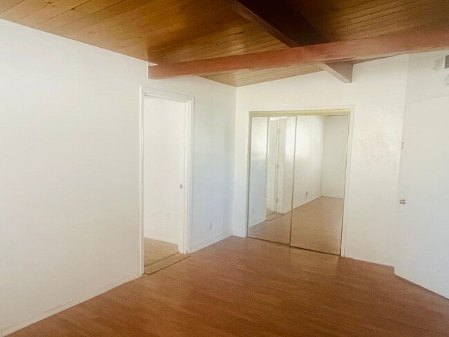 Building Photo - Charming 3-Bedroom Home with Wood Ceilings...