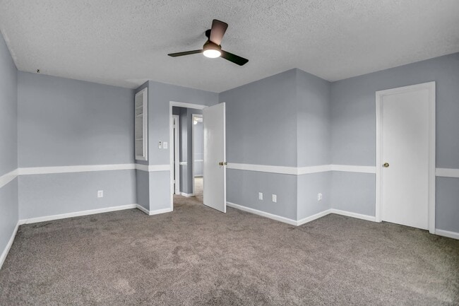 Building Photo - Spacious 4-Level Home with Deck, Workshop ...