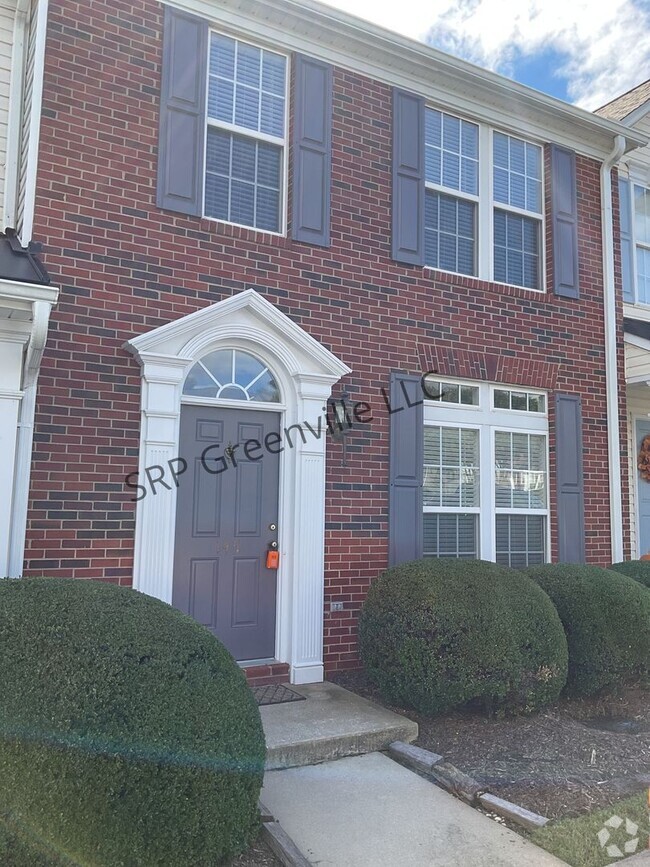 Building Photo - This beautiful brick, move-in-ready townho...