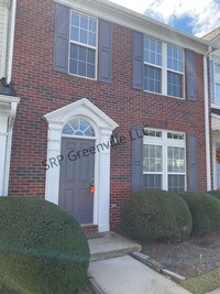 Building Photo - This beautiful brick, move-in-ready townho...