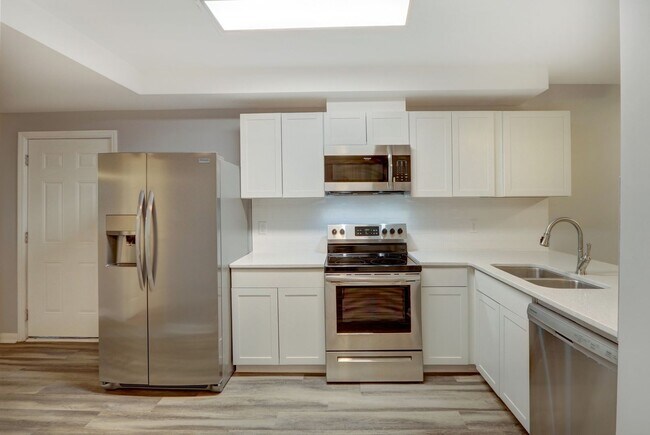 Building Photo - New Construction - Three Bedroom, Three Bathroom Home with yard & parking!