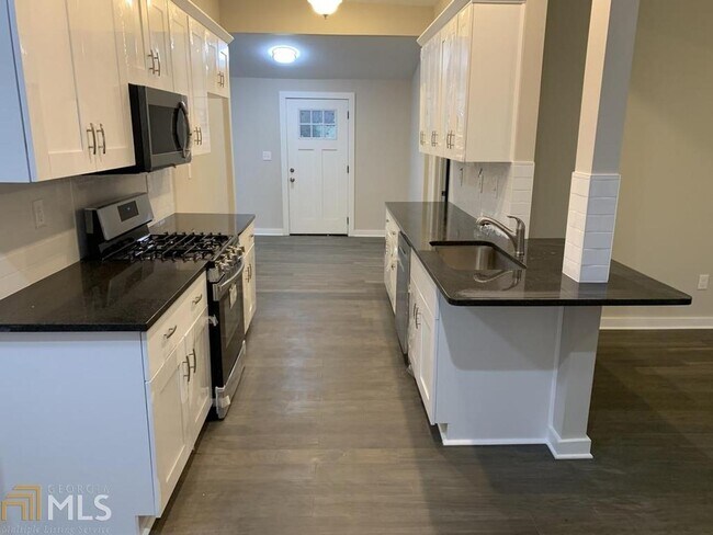 Building Photo - 6234 Collins St NE