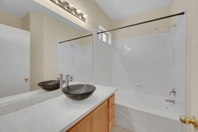 Building Photo - This beautifully updated 2-bedroom home is nestled in a gated community
