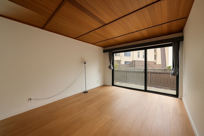 Building Photo - Modern 2BR/1.5BA Two-Level Condo w/ Patio ...