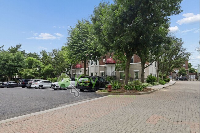 Building Photo - Spacious 2BR/2BA Duplex in Gated Community with Parking, Washer/Dryer & NYC Skyline Views