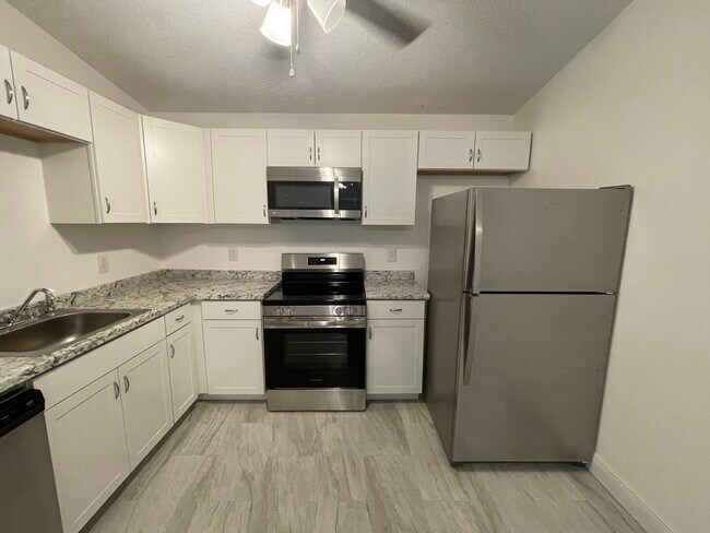 Building Photo - 6832 Tiki Ln