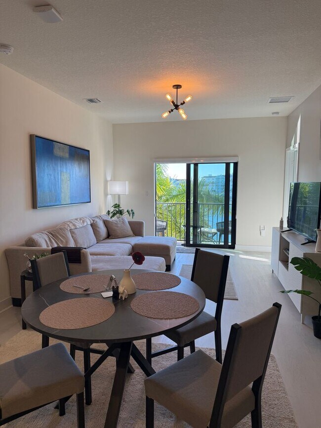 Building Photo - Premium Lake-View URBANA Residence Steps from Downtown Doral