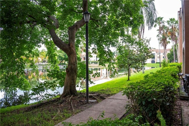 Building Photo - 4828 U.S. 441 Apt #8102, Coconut Creek, FL...