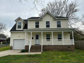 Building Photo - Welcome to this charming and spacious home!