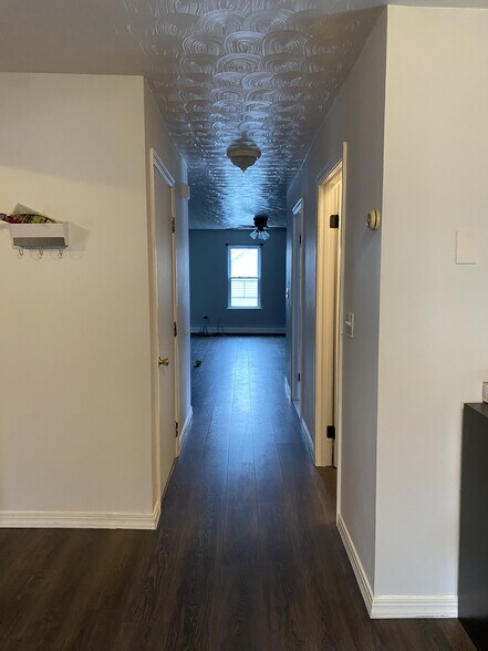 hallway facing livingroom from kitchen - 198 Tecumseh St