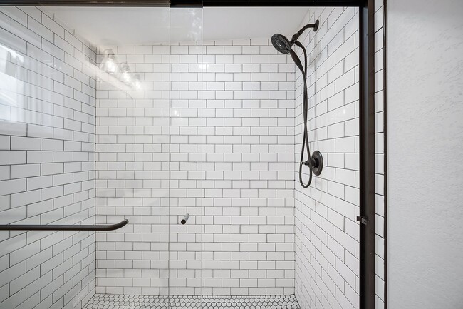 Building Photo - Remodeled and Furnished 1BD, 1BA in the Highlands with Off-Street Parking Spot