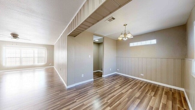 Building Photo - 3 bed 2 bath home with a carport in backyard